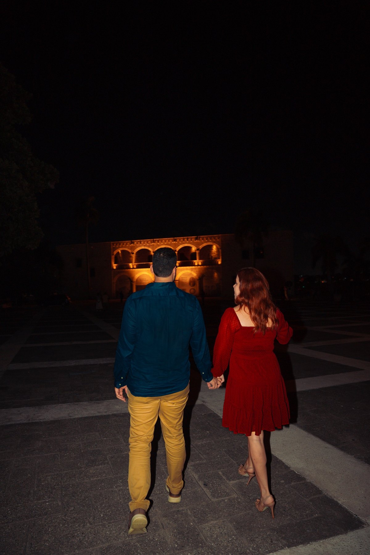 Couple walking together at night