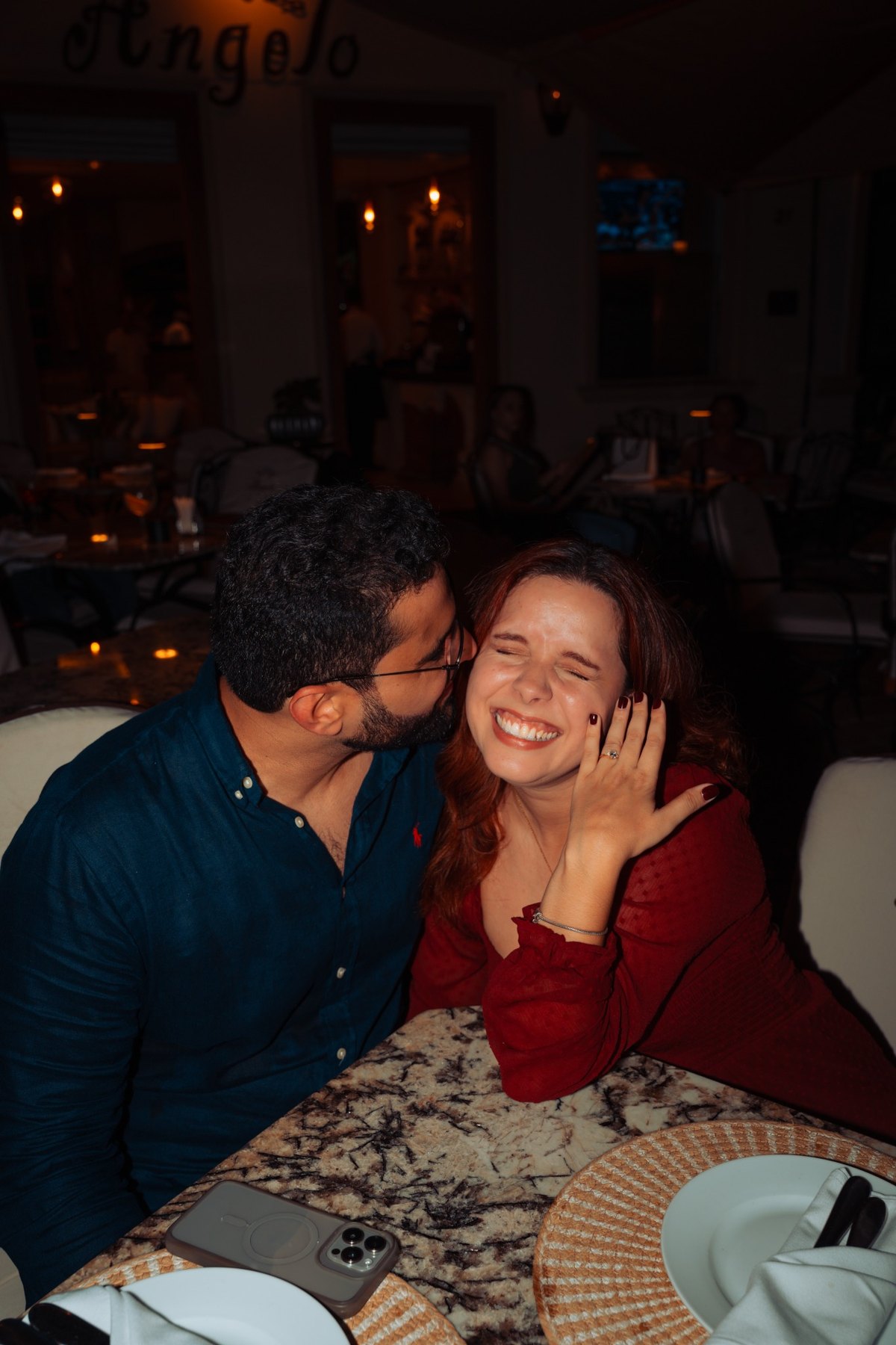Couple sharing a candid moment at dinner