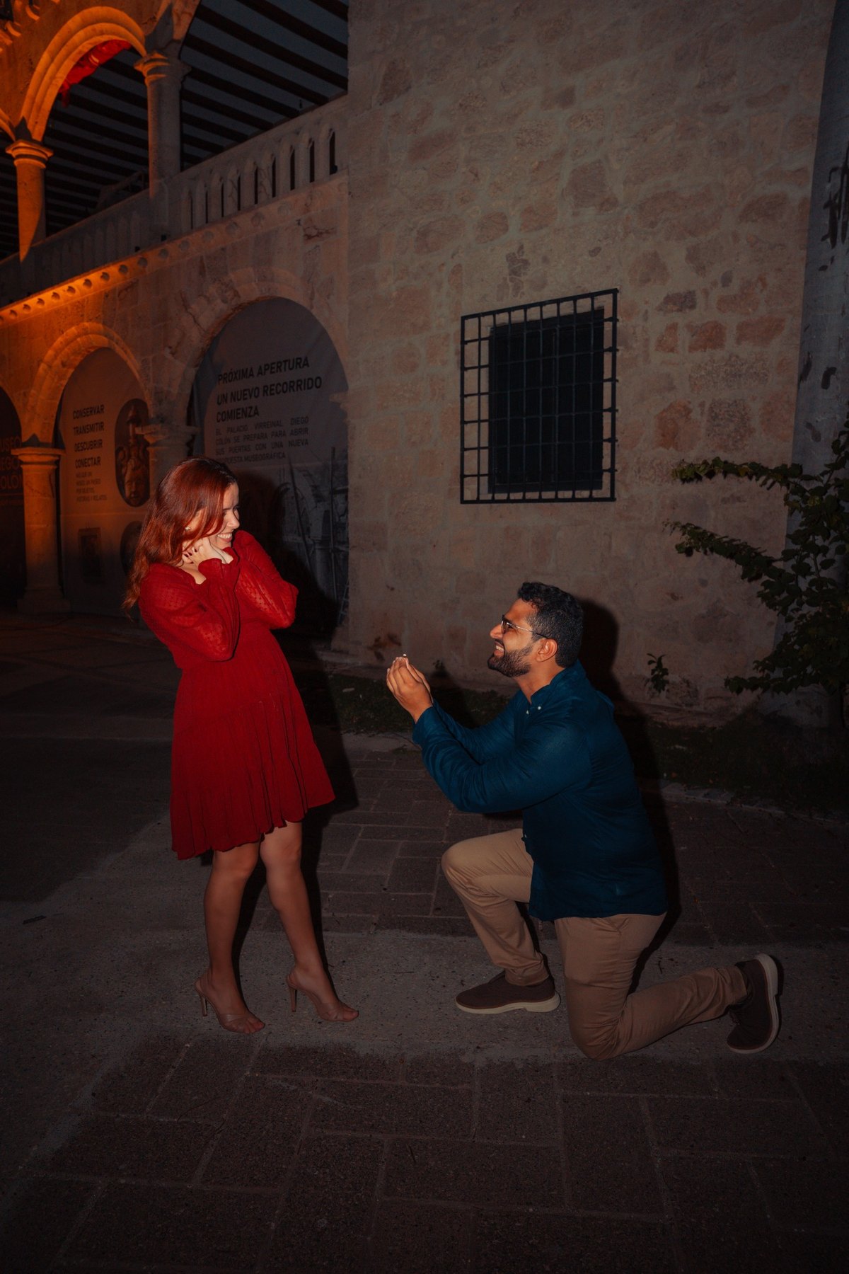 Surprised woman reacting to a marriage proposal